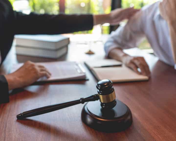 professional lawyer discussing legal options and solutions with a client in Richmond